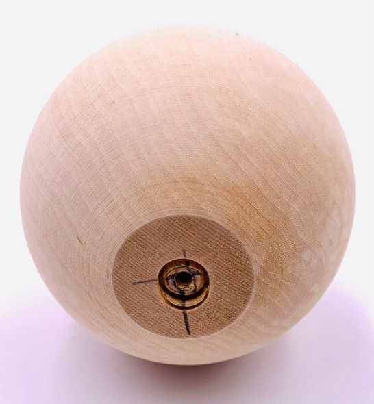 The bottom of the basswood ball.