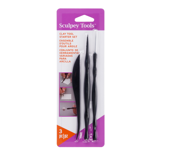 Showing  the Sculpey Clay Tool Starter Set inside the original packaging with three tools.