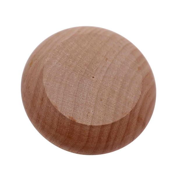 The outside of a wooden yo-yo half showing the rounded edges.