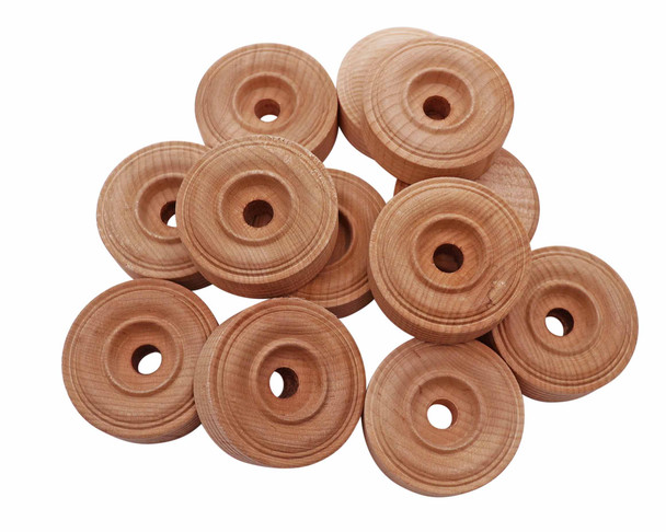 A group of treaded wood wheels.
