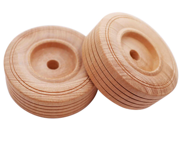 A pair of wood toy wheels 3" in diameter with treads.