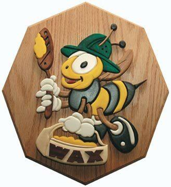 This is a view of the finished painted and built  Wax Bee Intarsia Plan with a bee wearing a hat holding a spoon in one hand and a bucket of wax in the other.