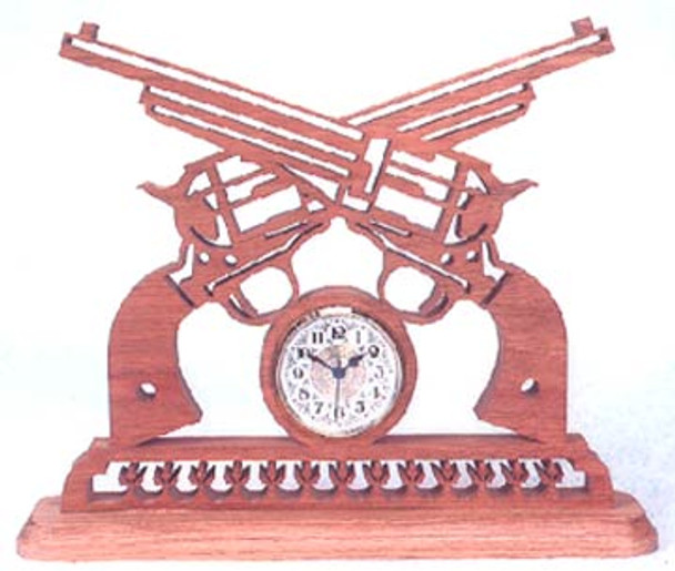 A oak scroll saw cutout of a 1875 Remington Army Revolver Clock Pattern with the barrels crossed and a clock insert below, on a wooden stand.