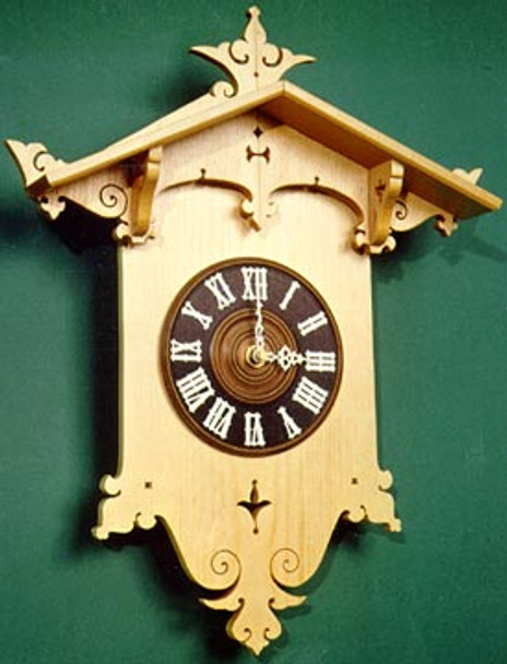 A finished piece using oak for the Bavarian Clock  scroll saw pattern with a cuckoo dial.

