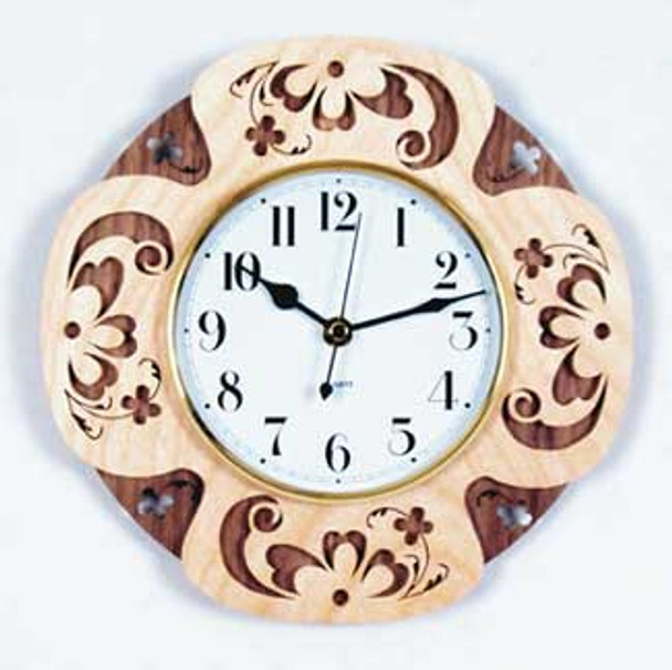 Finished Rosemaling clock made with contrasting wood.