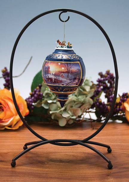 The Black Oval Ornament Holder shows an ornament hanging from the black holder.