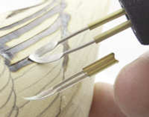 Shown in this photo is a Quill woodburning tip featuring how the tip burns feather outlines.