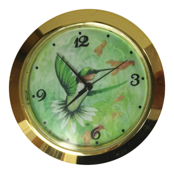 A 2" clock insert showing the front with Arabic numbers and a hummingbird design painted on the face of the clock dial.
