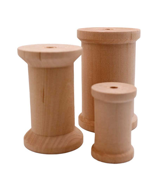 A group of wooden spools.
