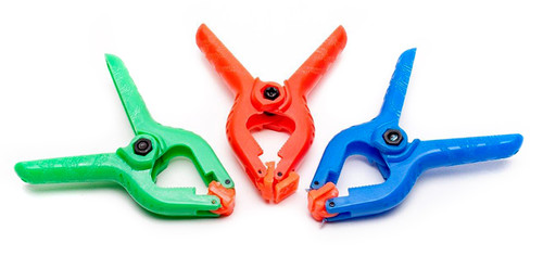 2" plastic clip perfect for quick alterations for photo shoots.