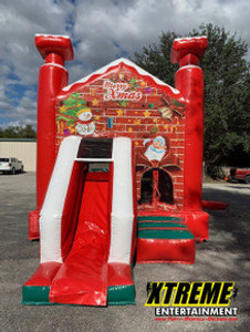 "Santa house combo with a slide for kids at a holiday event"