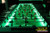 "Interactive 8-person LED foosball table lit up for nighttime outdoor event"