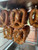 "Pretzel warmer displaying hot, freshly baked pretzels"