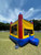 Colorful Castle Bounce House inflatable rental — perfect for kids’ parties, school events, and outdoor celebrations.