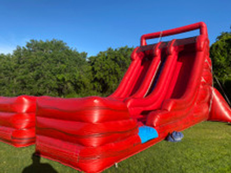 "Big red inflatable slide for kids party rental"