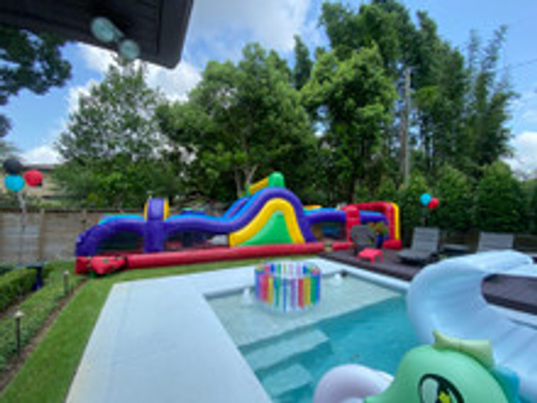 35ft Obstacle Challenge inflatable course for rent — a high-energy adventure with climbing walls, tunnels, and slides, ideal for school events and festivals.