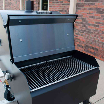 Cooking surface of an ABS Pit-Boss Smoker and Grill with Pellet System