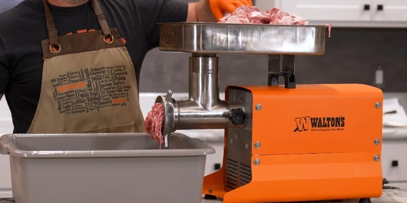 meat grinder in use