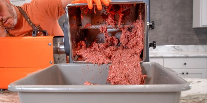 meat mixer in use