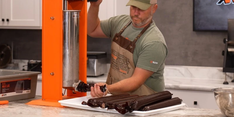 sausage stuffer in use