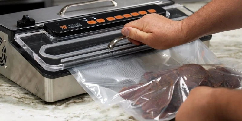 vacuum sealer in use
