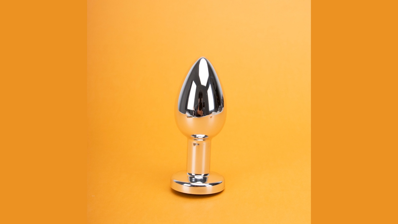 Triple Pleasure Glow: Remote Vibrating Stainless Steel Anal Plug with LED Lights & 10 Modes