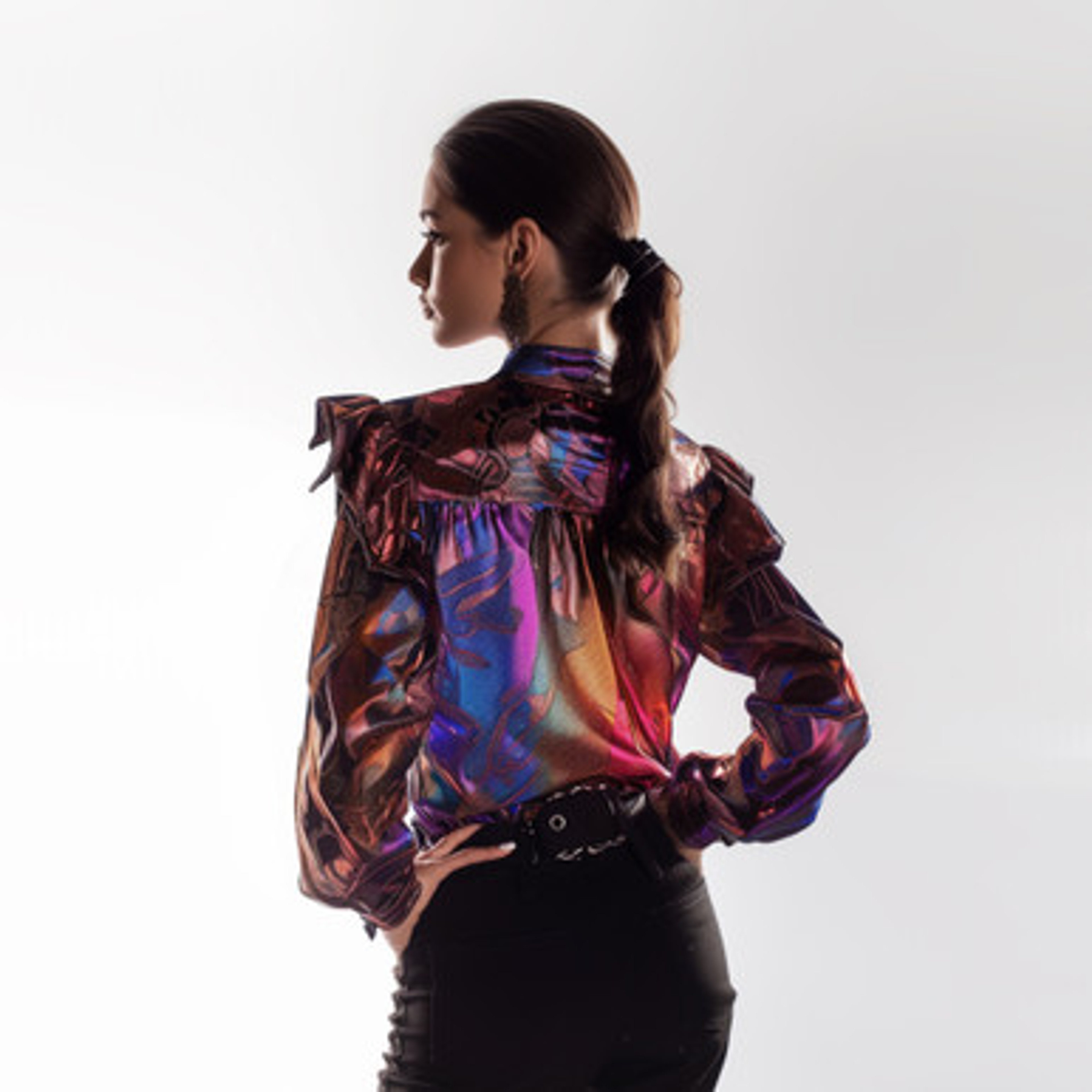 Blue Lacy puppy laying in grass