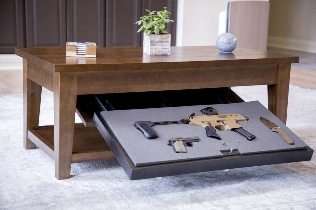 tactical coffee table with guns and knives opened