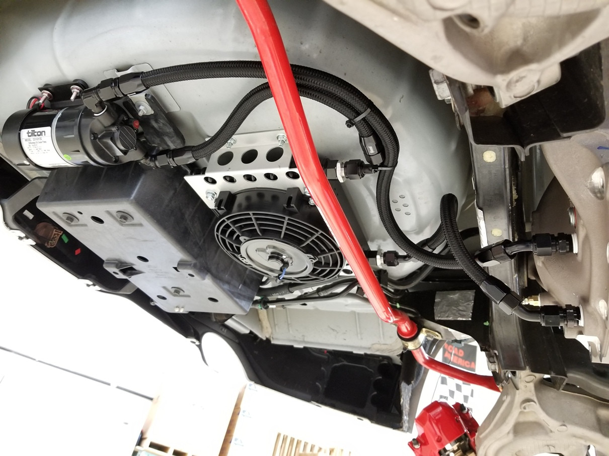 View of the  plumbing of the 15-23 Mustang (S550) Differential Cooler Kit by Full Tilt Boogie. Part # FT 570.