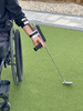 Close-up of golf club with Swing Mate forearm mounted wheelchair golf aid.