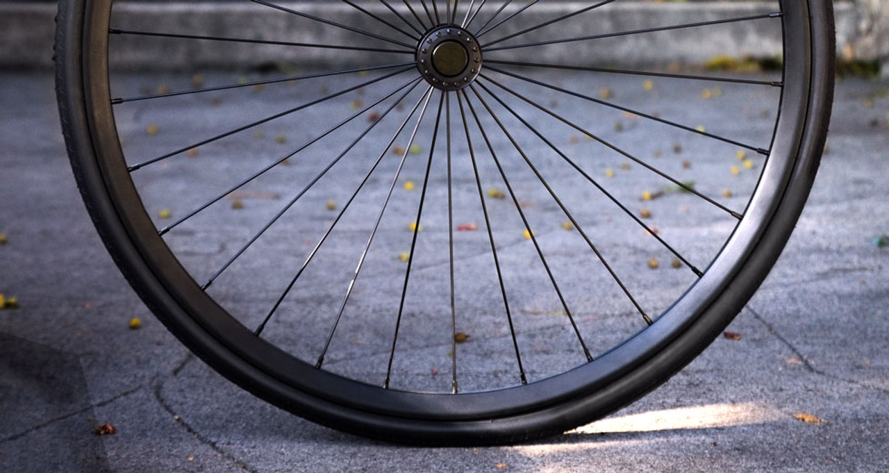 Spokes are straight and have a gauge (14 gauge, 2.0mm) commonly used for quality bicycle wheels for proven durability.

Sleek low flange 6061 Aluminum hub reduces weight making the Shadow lighter than the competitors.