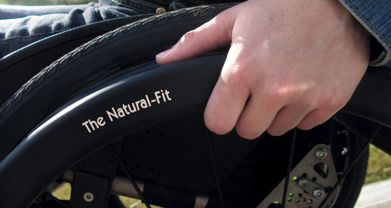 Ergonomic grip incorporates two components, an oval and a thumb piece that sits between the oval and the wheel rim and reduces effort to grip to the rim. The Natural-Fit's ergonomic grip makes it possible to cover the same ground with less work and less fatigue.