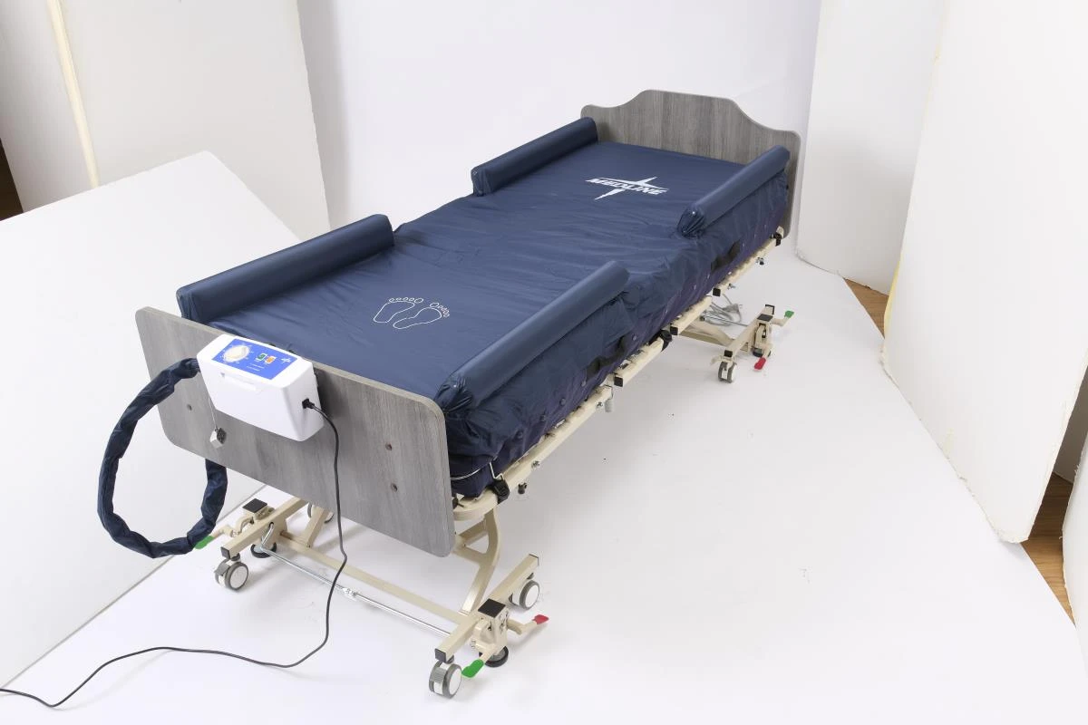 Supra Air Raised-Edge Mattress and Pump on Bed
