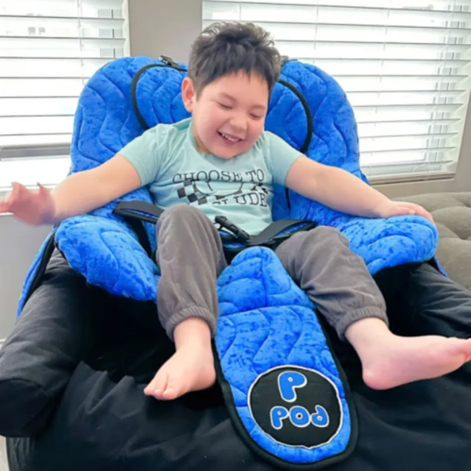 Child using the P Pod Postural Support