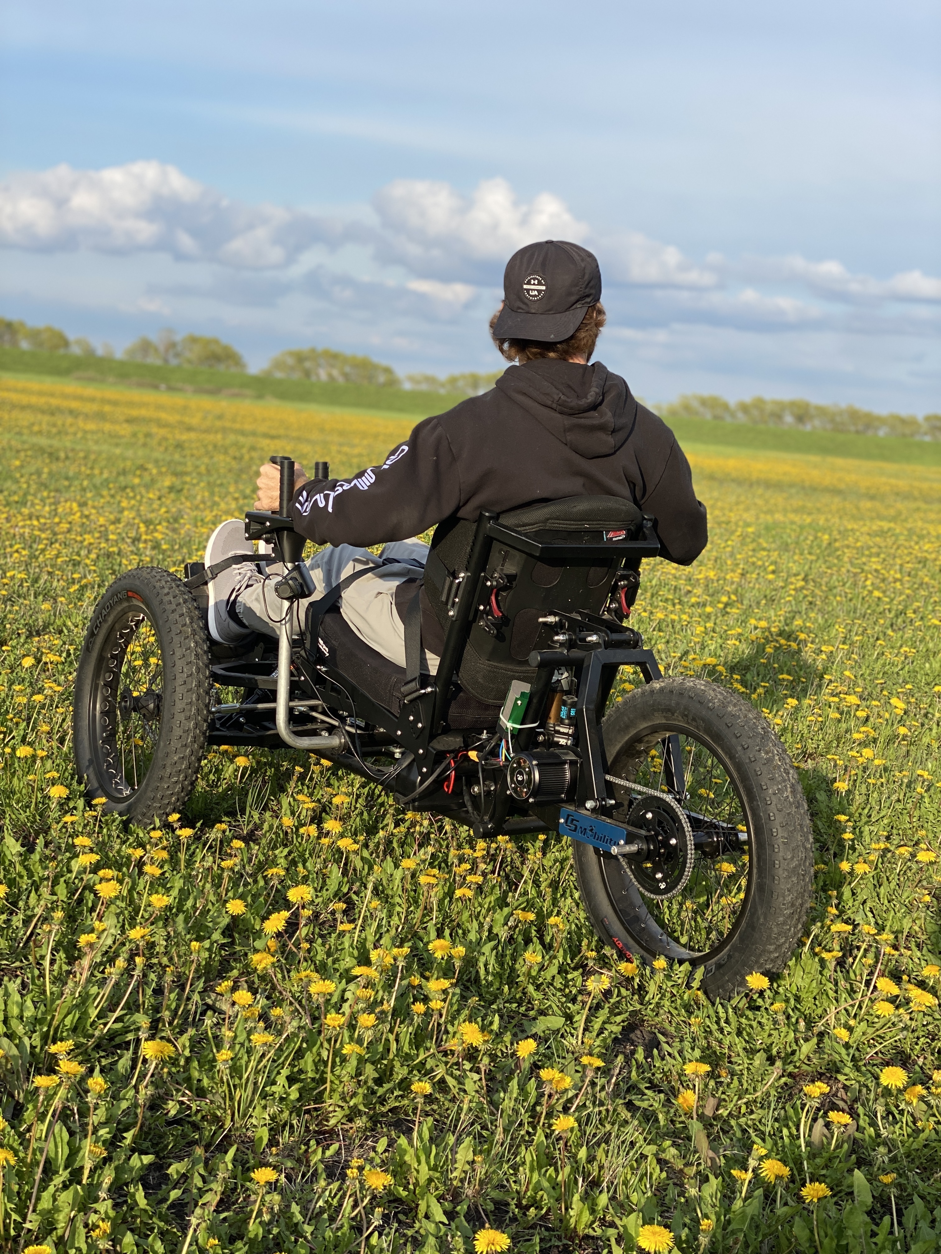 Liberty Rover Off-Road Electric Wheelchair in fields, perfect for exploring the outdoors.