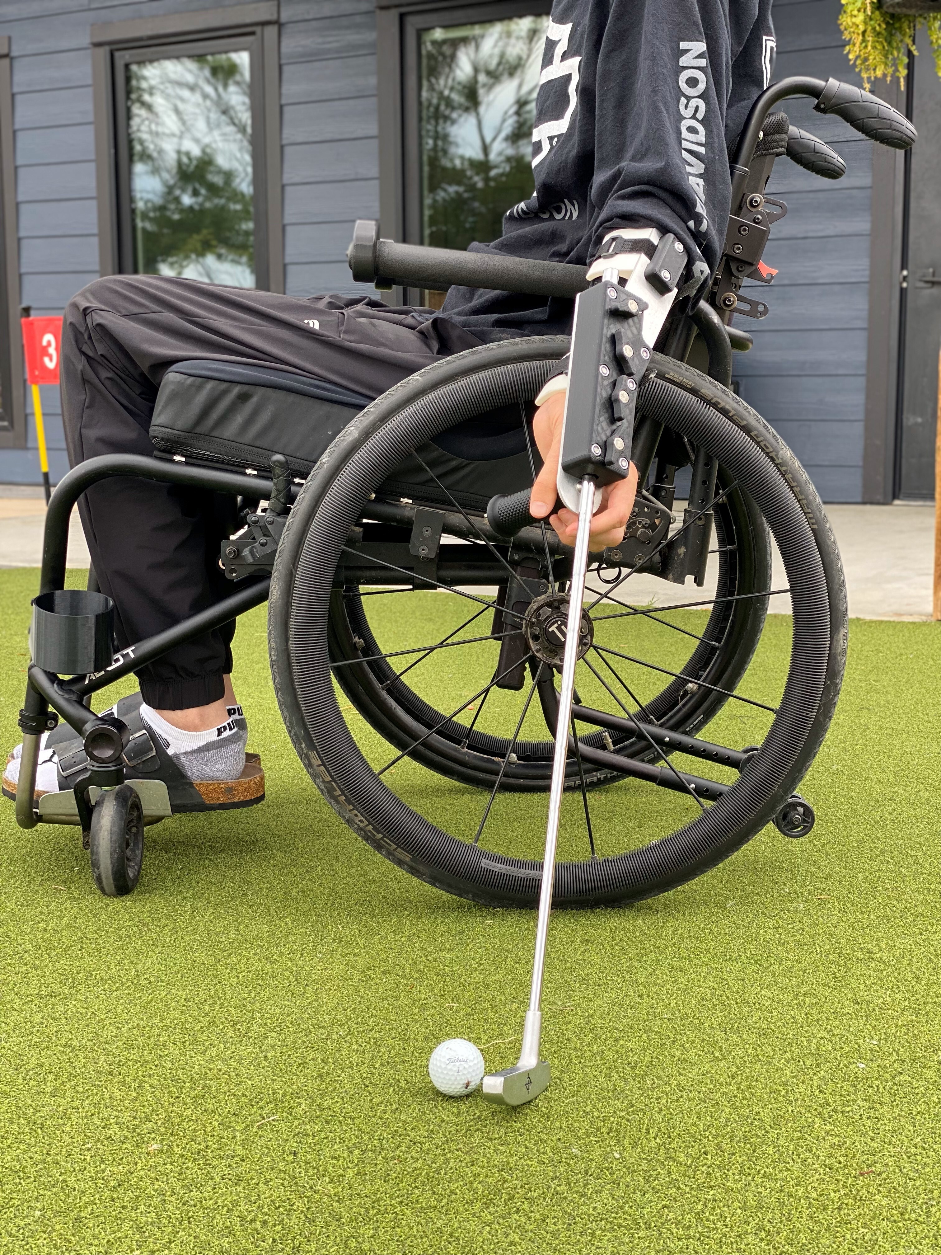 living-spinal-c5-mobility-swing-mate-forearm-mounted-wheelchair-golf-side-profile.jpg