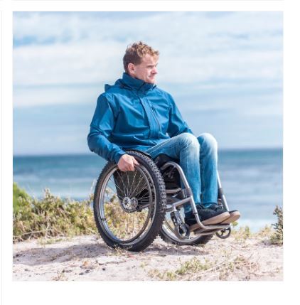 living-spinal-kinetic-balance-3-1-jacket-blue-rain-on-a-wheelchair.jpg