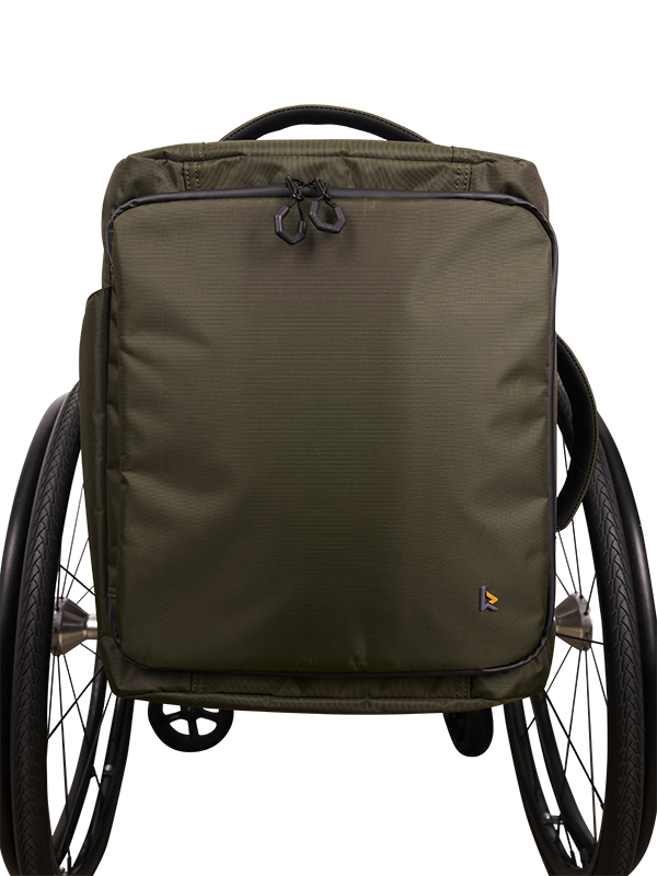 living-spinal-kinetic-balance-wheelchair-bag-backrest-travel-pack-ii-deep-green-on-wh1eelchair-2.png