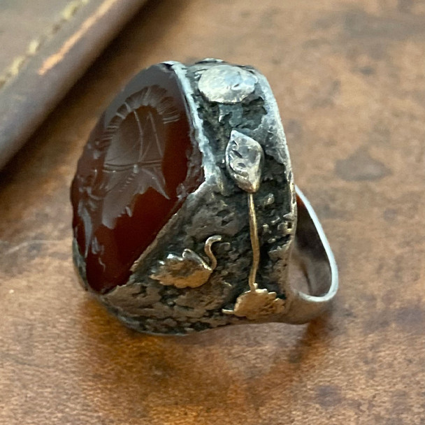 Early 1800s Sterling 10K Gold Carnelian Conquistador Ring looking down at front/side of ring