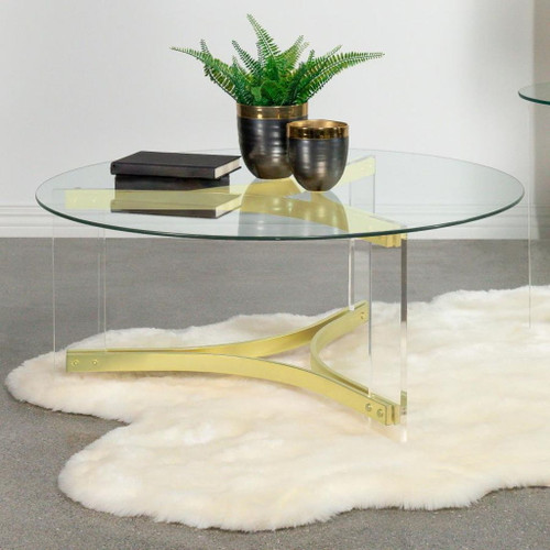 Janessa - Round Glass Top Coffee Table With Acrylic Legs - Clear And Matte Brass