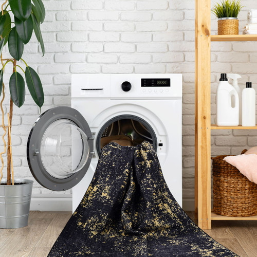 Maval - 4' X 6' Washable Area Rug - Black / Gold