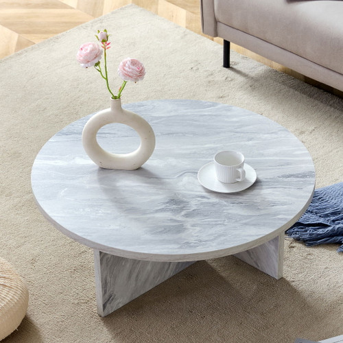 Versatile Round Coffee Table For Various Interior Styles