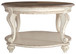 Realyn - Oval Cocktail Table - White / Brown