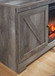 Wynnlow - 63" TV Stand With Glass/Stone Fireplace Insert - Gray