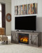 Wynnlow - Gray - TV Stand With Faux Firebrick Fireplace Insert