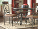 Glambrey - Brown - 5 Pc. - Dining Room Table, 4 Upholstered Side Chairs