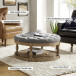 Enipeus Transitional Polyester Storage Button-tufted Round Small Ottoman with Solid Wood Legs and Nailhead Trim