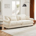 Modern Velvet Sofa With Bolstered Armrests And Pillows