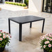 Modern Outdoor Table With Alternating Wide And Narrow Slats, Angled Corners, 2" Big Umbrella Hole, And Adjustable Non Slip Pads - Bourbon Brown