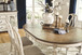 Realyn - Oval Dining Table Set